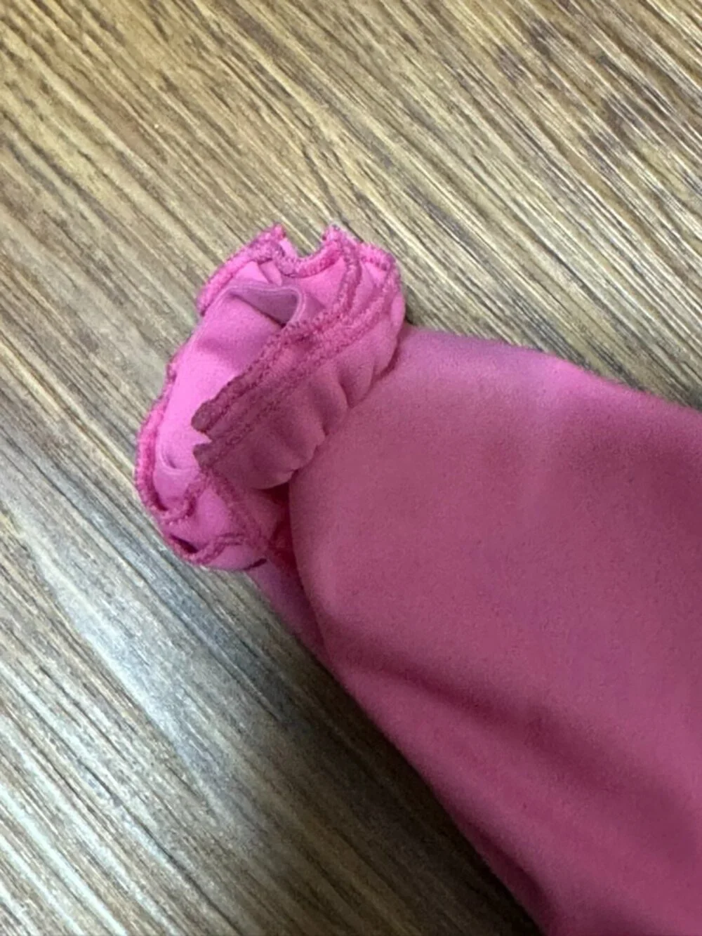 Ruffle Butts Rashgaurd size 12-18 months Pink heart print with ruffle sleeve